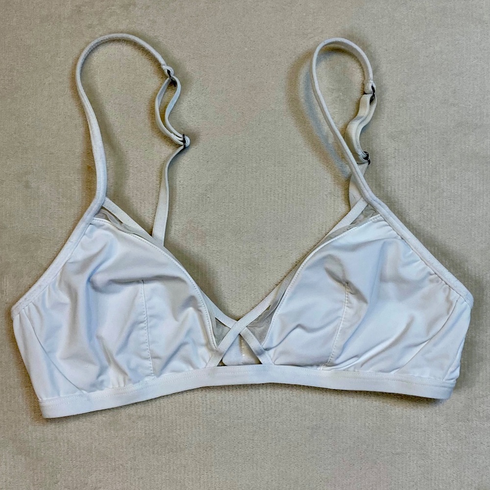 White bra with sheer mesh detailing. No padding no underwire. Bralette lingerie